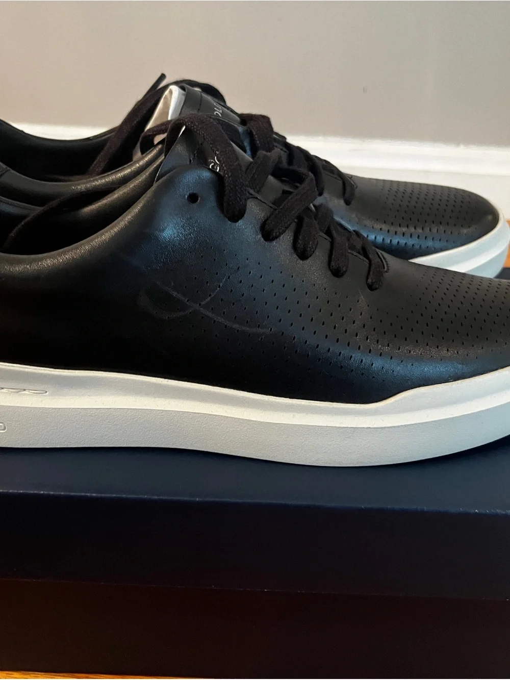 Cole Haan Black Leather Perforated Low-Top Sneakers with White Sole